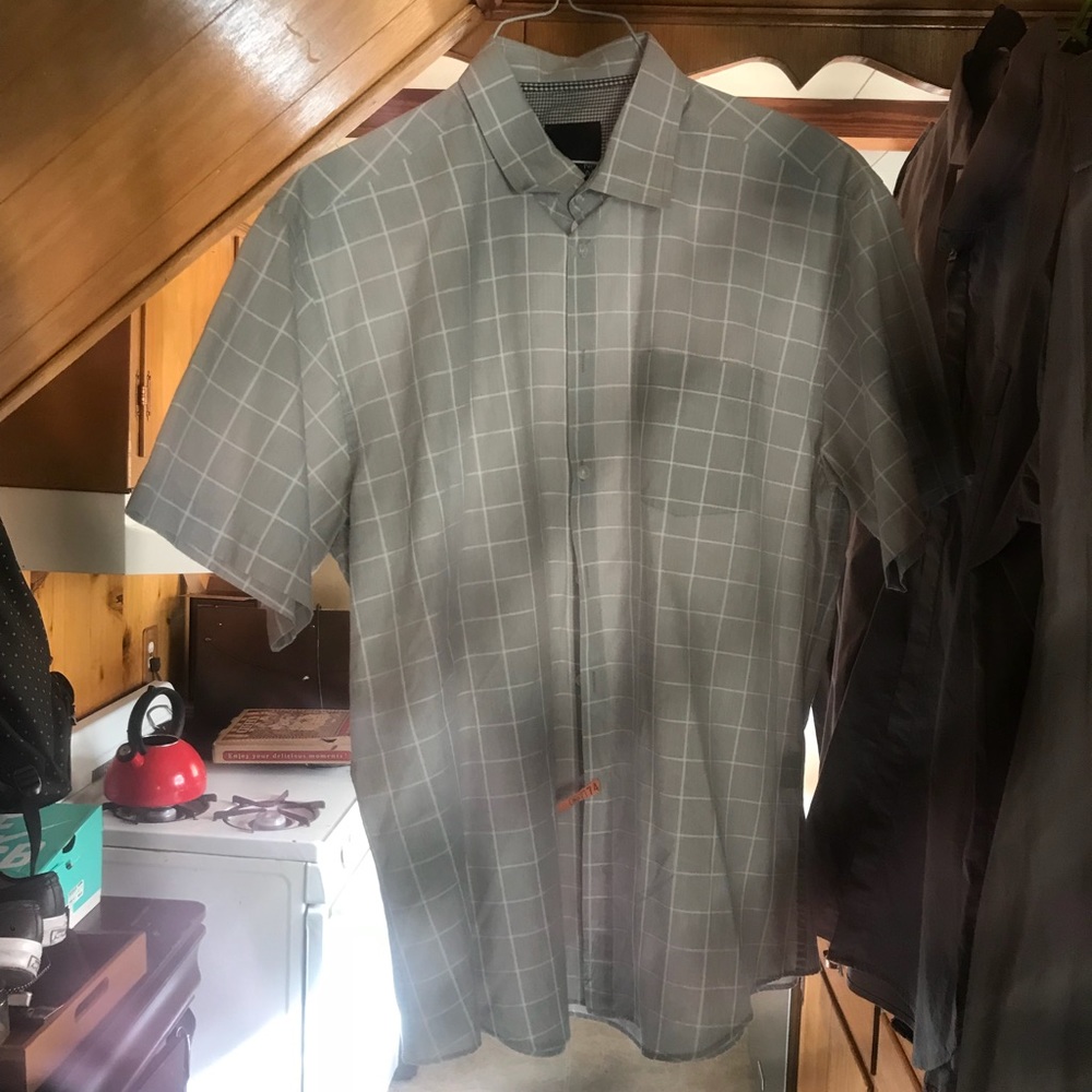 Nm an short sleeved collared shirt worn once